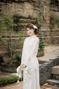 Elegant Asian Beauty: A Gentle Girl Adorned with a Pure White Orchid-7