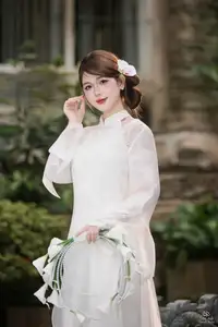 Elegant Asian Beauty: A Gentle Girl Adorned with a Pure White Orchid-4