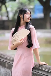 Embracing Vietnamese Grace: Pink Ao Dai Beauty at an Ancient Temple-2