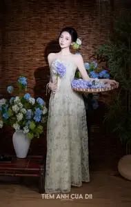 Ethereal Vietnamese Beauty: Graceful Asian Girl in Modern Yếm with Delicate Blooms.-2