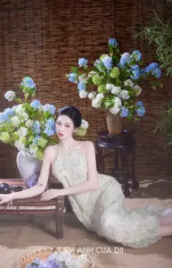 Ethereal Vietnamese Beauty: Graceful Asian Girl in Modern Yếm with Delicate Blooms.-3