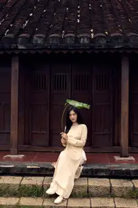 Timeless Vietnamese Beauty: Elegant Ao Dai Girl Amidst Ancient Architecture - Photo 597392964_1911130843144618_1615706383643237778_n.jpg-10