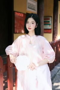 Elegant Vietnamese Girl on Red Lantern Street: Captivating Style & Cultural Charm-1