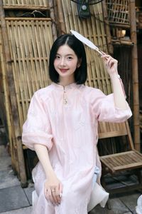 Elegant Vietnamese Girl on Red Lantern Street: Captivating Style & Cultural Charm-3