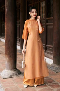 Timeless Grace: Amber Ao Dai in Ancient Architecture-2