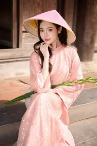 Discover Asian Beauty: Elegant Girl in Dreamy Pink Ao Dai Portrait-9