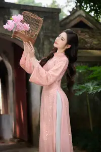 Discover Asian Beauty: Elegant Girl in Dreamy Pink Ao Dai Portrait-2
