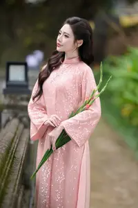 Discover Asian Beauty: Elegant Girl in Dreamy Pink Ao Dai Portrait-5