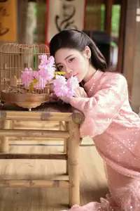 Discover Asian Beauty: Elegant Girl in Dreamy Pink Ao Dai Portrait-17
