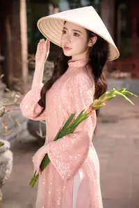 Discover Asian Beauty: Elegant Girl in Dreamy Pink Ao Dai Portrait-12