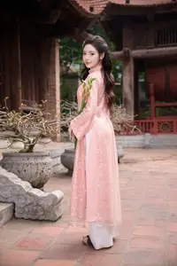 Discover Asian Beauty: Elegant Girl in Dreamy Pink Ao Dai Portrait-15