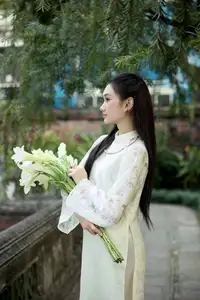 Graceful East Asian Beauty: Woman in Traditional Attire, Elegant with a Paper Fan.-4
