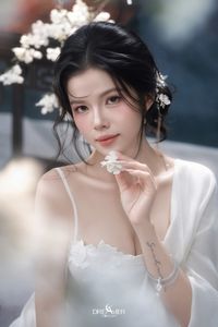 Discover Ethereal Grace: An Asian Beauty in Pure White Amidst Delicate White Blossoms-0