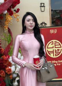 Radiant Vietnamese Beauty in Pink Ao Dai, Elegant Traditional Charm-3