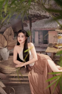 VGU No.78: Elegant Vietnamese Girl Showcasing Traditional Beauty Amidst Rustic Charm-5