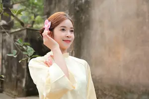 Graceful Vietnamese Girl in Traditional Ao Dai  Discover Timeless Beauty and Elegance-3