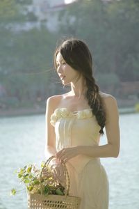 Elegant Beauty of a Girl by the Lake in Serene Natural Scenery-10