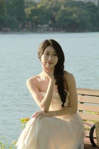 Elegant Beauty of a Girl by the Lake in Serene Natural Scenery-9