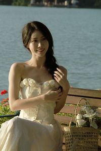 Elegant Beauty of a Girl by the Lake in Serene Natural Scenery-0