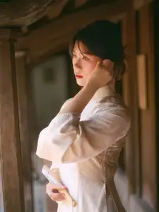 Graceful Asian Beauty: A Vietnamese Woman in Traditional Attire, Evoking Timeless-3