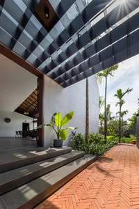 Stunning Tent-Inspired Modern House in Nha Trang: A Tropical Oasis Blending Innovative Architecture with Lush Indoor Gardens and Natural Light-0
