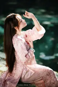 Vietnamese Charm: Elegant Beauty in Pink Traditional Attire-12