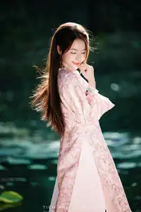 Vietnamese Charm: Elegant Beauty in Pink Traditional Attire-3