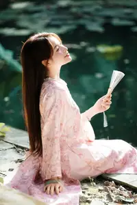 Vietnamese Charm: Elegant Beauty in Pink Traditional Attire-15