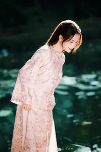 Vietnamese Charm: Elegant Beauty in Pink Traditional Attire-16