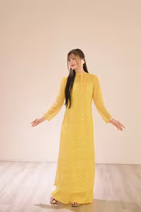 VGU No.105: Vietnamese Girl in Yellow Áo Dài Shines in Modern City – Captivating Beauty-5