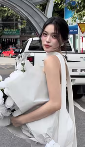 VGU No.8: Young Woman in White Dress with Pristine White Rose Bouquet and Charming Smile.-1