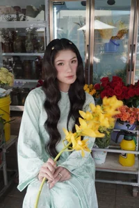 Stunning Transformation: Vietnamese Karate Champion Trang Cẩm Lành Embraces Elegance in Traditional Áo Dài Fashion-3