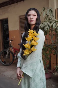 Stunning Transformation: Vietnamese Karate Champion Trang Cẩm Lành Embraces Elegance in Traditional Áo Dài Fashion-5