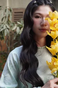 Stunning Transformation: Vietnamese Karate Champion Trang Cẩm Lành Embraces Elegance in Traditional Áo Dài Fashion-4