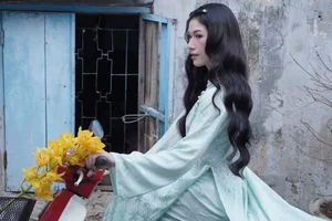 Stunning Transformation: Vietnamese Karate Champion Trang Cẩm Lành Embraces Elegance in Traditional Áo Dài Fashion-0