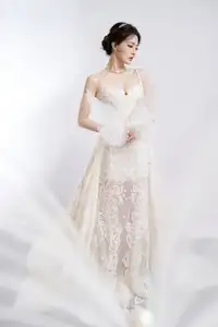 Ethereal Beauty: Model in Elegant Lace Wedding Gown | Chic Evening Dress Design-0