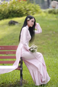 VGU No.119: Elegant Vietnamese Beauty in Pink Ao Dai Amidst Nature's Serenity-10