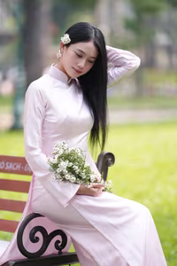 VGU No.119: Elegant Vietnamese Beauty in Pink Ao Dai Amidst Nature's Serenity-0