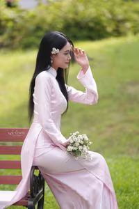 VGU No.119: Elegant Vietnamese Beauty in Pink Ao Dai Amidst Nature's Serenity-1