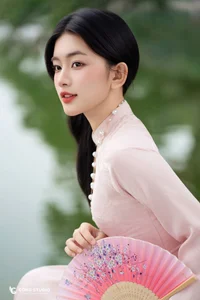 Graceful Muse in Traditional Pink Ao Dai-0