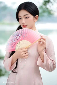 Graceful Muse in Traditional Pink Ao Dai-7